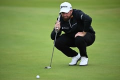 COME AND GET ME: Lowry takes charge; McIlroy, Woods miss cut